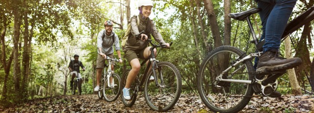 group-friends-ride-mountain-bike-forest-together.jpg